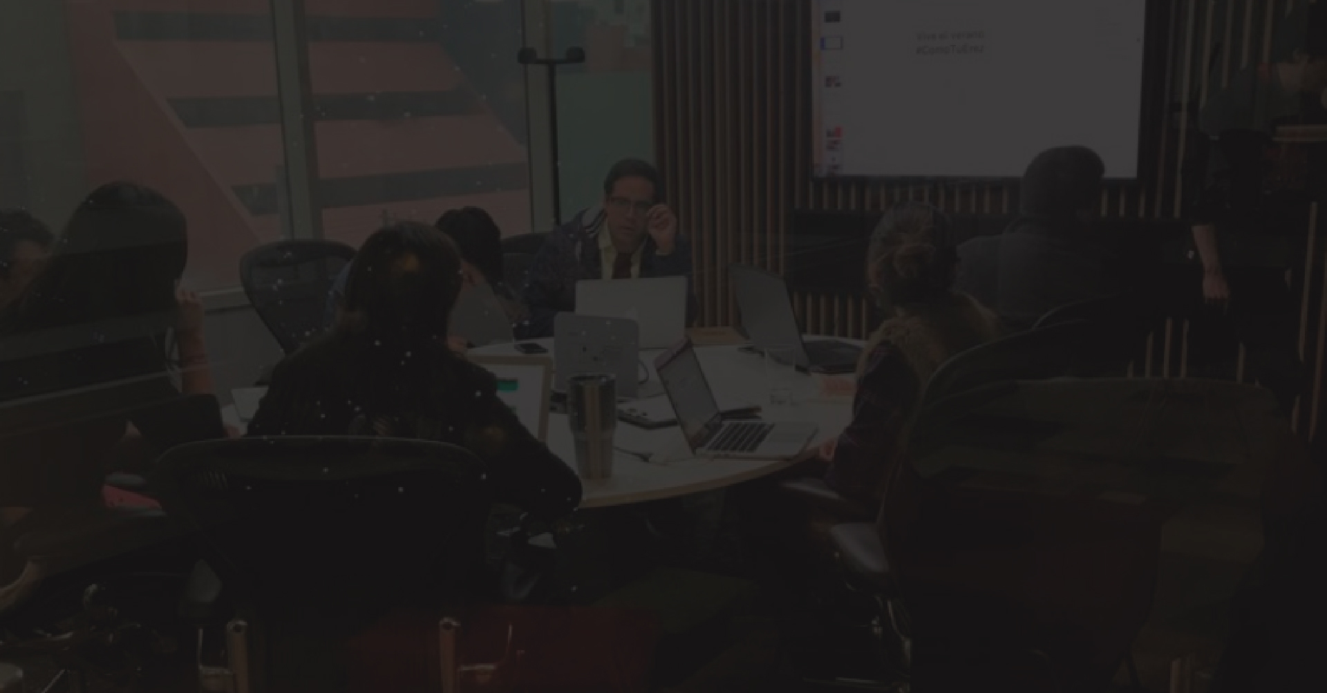 People having a meeting in a circular table