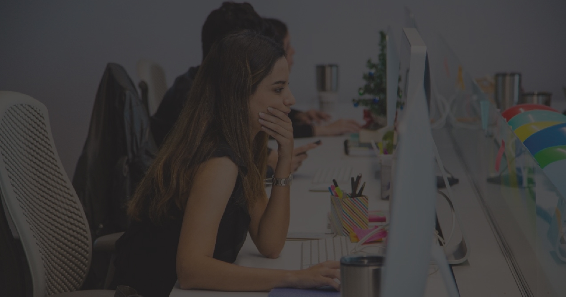 Lateral view of people working in an office 